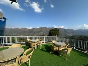 Hilltop Retreat by Kasauli Vista